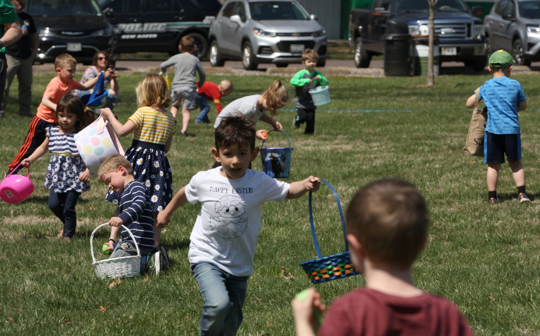 Children looks for Easter eggs